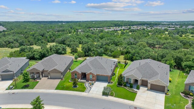 306 Iron Rail Ln, Georgetown, TX 78633 - aerial view of residential area with a heavily wooded area