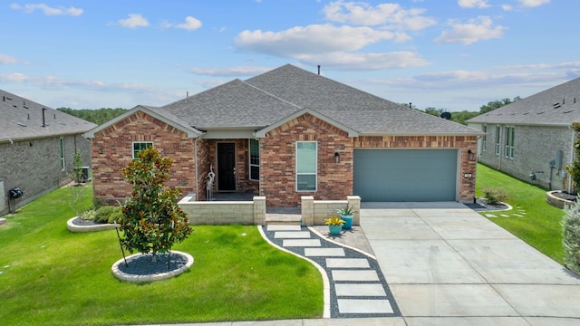 306 Iron Rail Ln, Georgetown, TX 78633 - view of front facade featuring brick siding, an attached garage, concrete driveway, a shingled roof, and a front yard