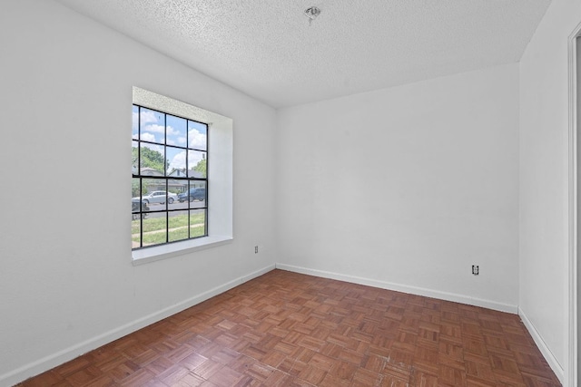 12323 Alderbrook Dr, Austin, TX 78758 - empty room featuring a textured ceiling and fire sprinkler in ceiling