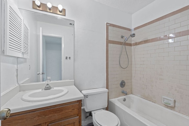12323 Alderbrook Dr, Austin, TX 78758 - full bathroom with vanity, shower / tub combination, and a textured ceiling