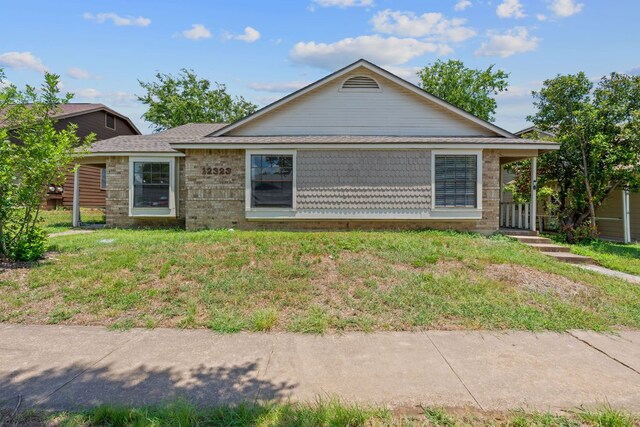 12323 Alderbrook Dr, Austin, TX 78758 - view of front facade with brick siding