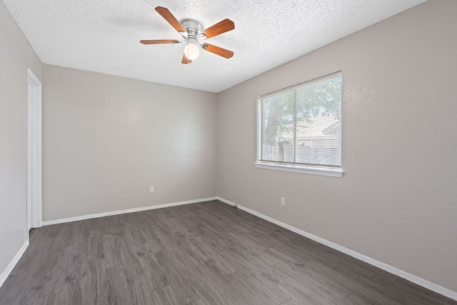 12323 Alderbrook Dr, Austin, TX 78758 - unfurnished room with dark wood-style flooring, ceiling fan, and a textured ceiling