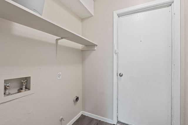 12323 Alderbrook Dr, Austin, TX 78758 - laundry area featuring washer hookup, dark wood-type flooring, and electric dryer hookup