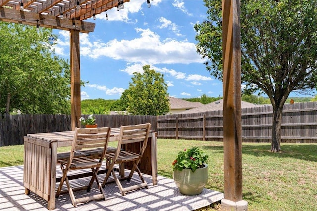 161 Buttercup Way, Kyle, TX 78640 - fenced backyard with outdoor dining area and a pergola