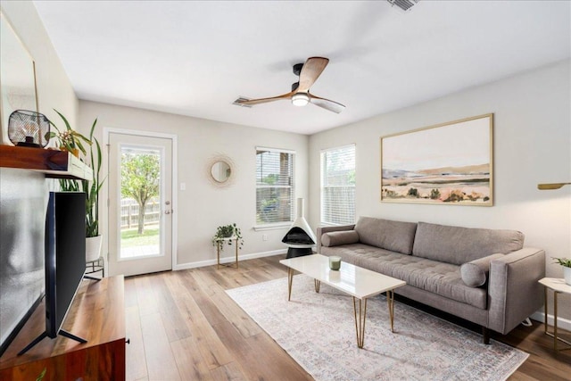 161 Buttercup Way, Kyle, TX 78640 - living area with wood finished floors and ceiling fan