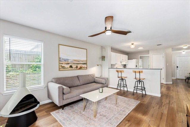 161 Buttercup Way, Kyle, TX 78640 - living room with dark wood-style flooring and ceiling fan