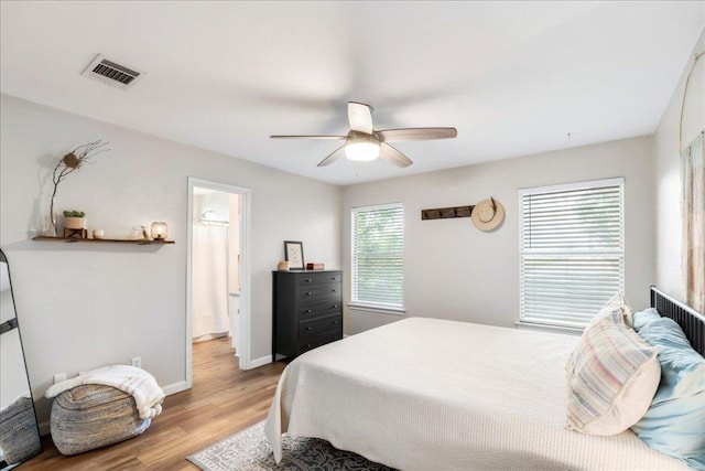 161 Buttercup Way, Kyle, TX 78640 - bedroom with light wood finished floors and a ceiling fan