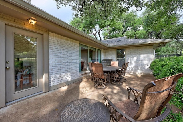 9202 Spring Hollow Dr, Austin, TX 78750 - view of patio with outdoor dining area and grilling area