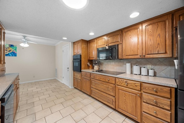 9202 Spring Hollow Dr, Austin, TX 78750 - kitchen with black appliances, brown cabinetry, backsplash, light countertops, and a textured ceiling