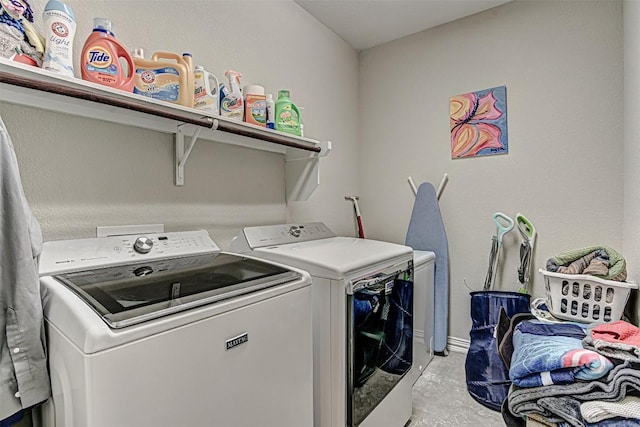 536 Middle Brook Dr, Leander, TX 78641 - washroom with separate washer and dryer and baseboards