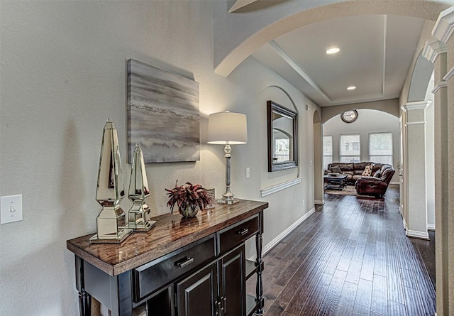 536 Middle Brook Dr, Leander, TX 78641 - hallway featuring arched walkways, dark wood-style floors, and recessed lighting