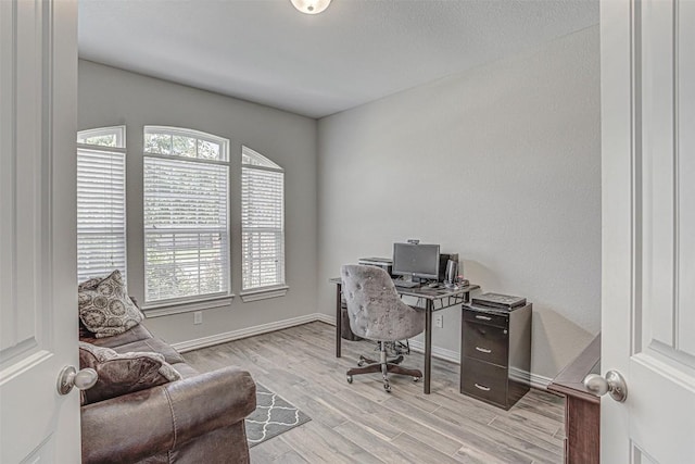 536 Middle Brook Dr, Leander, TX 78641 - office area with light wood-style flooring and baseboards