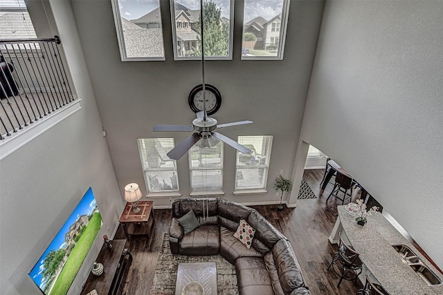 536 Middle Brook Dr, Leander, TX 78641 - living room featuring ceiling fan, wood finished floors, and a towering ceiling