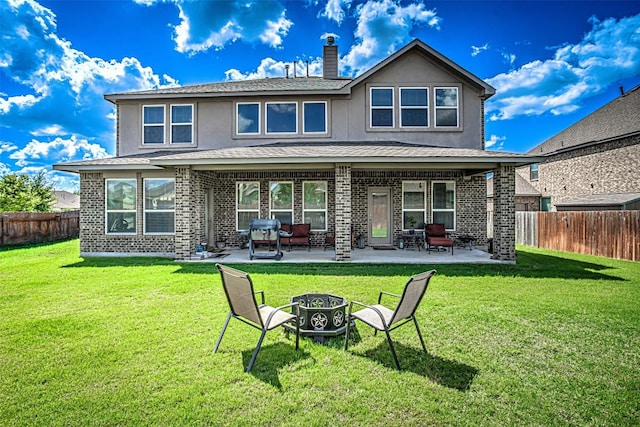 536 Middle Brook Dr, Leander, TX 78641 - rear view of property with a patio, stucco siding, a fenced backyard, and brick siding