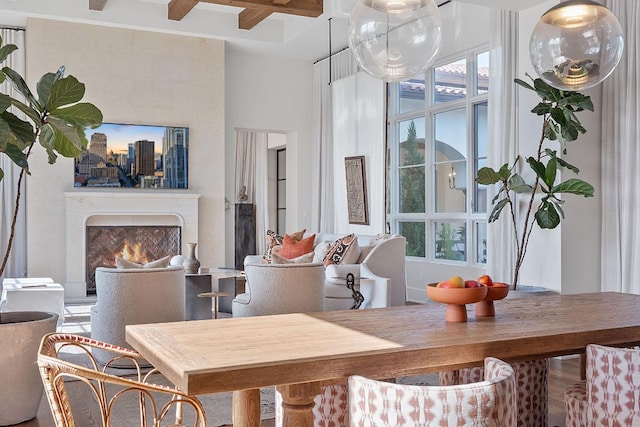 4716 Peralta Ln, Austin, TX 78735 - dining area featuring healthy amount of natural light, coffered ceiling, beamed ceiling, and a premium fireplace