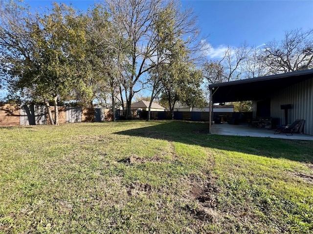 TBD Caldwell St, Lexington, TX 78947 - view of yard featuring a patio and a carport