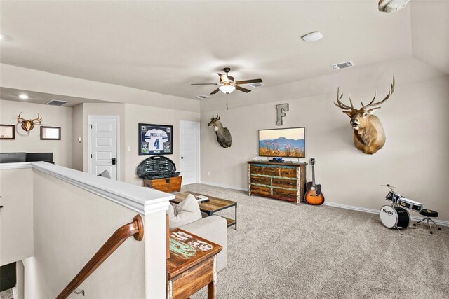 205 Goshen Dr, Dripping Springs, TX 78620 - living area with carpet floors and ceiling fan