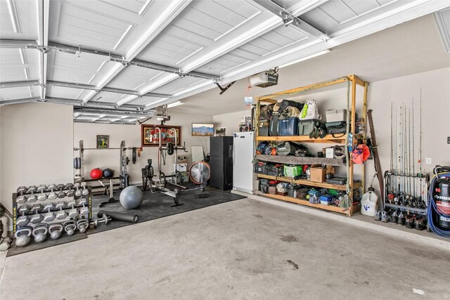 205 Goshen Dr, Dripping Springs, TX 78620 - garage featuring a garage door opener