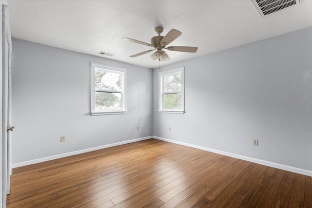18000 Lafayette Park Rd, Jonestown, TX 78645 - empty room with a ceiling fan and hardwood / wood-style flooring