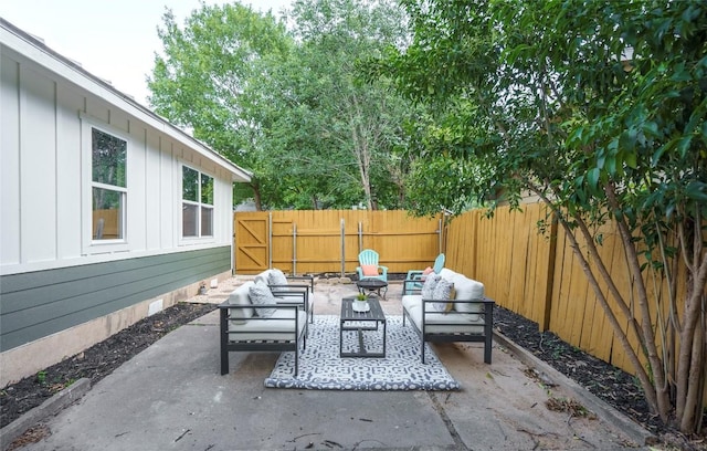 5714 Ave D, Austin, TX 78752 - fenced backyard with an outdoor living space and a patio area