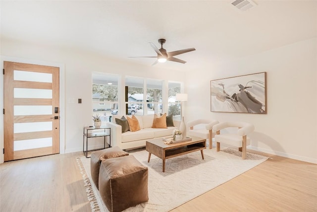 5714 Ave D, Austin, TX 78752 - living room featuring light wood-style floors and ceiling fan