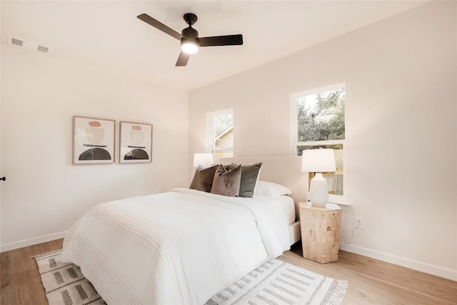 5714 Ave D, Austin, TX 78752 - bedroom with light wood-type flooring and a ceiling fan