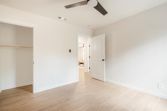 5714 Ave D, Austin, TX 78752 - unfurnished bedroom featuring light wood finished floors, a closet, and a ceiling fan
