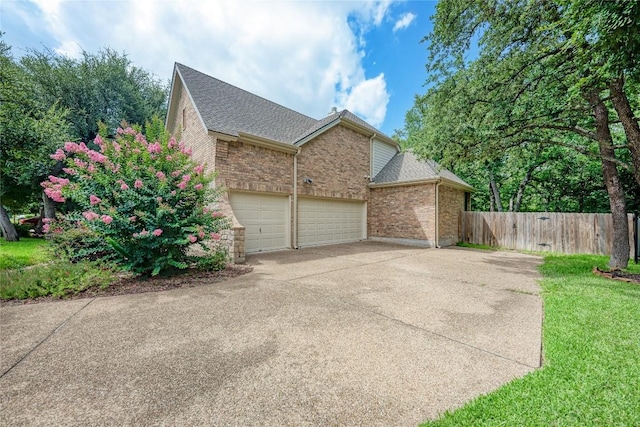 1160 Waimea Bnd, Round Rock, TX 78681 - view of side of property with brick siding, concrete driveway, roof with shingles, and an attached garage