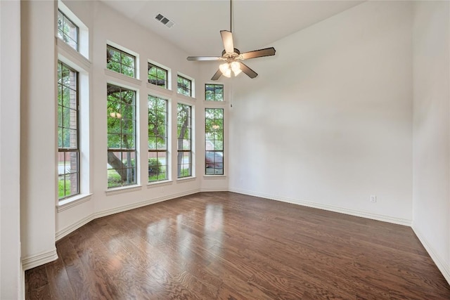 1160 Waimea Bnd, Round Rock, TX 78681 - spare room featuring plenty of natural light, ceiling fan, and dark wood-style floors