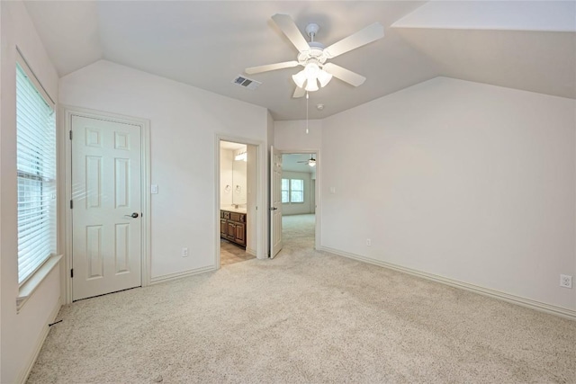 1160 Waimea Bnd, Round Rock, TX 78681 - unfurnished bedroom with lofted ceiling, light carpet, connected bathroom, and ceiling fan