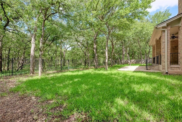 1160 Waimea Bnd, Round Rock, TX 78681 - fenced backyard featuring ceiling fan and a patio