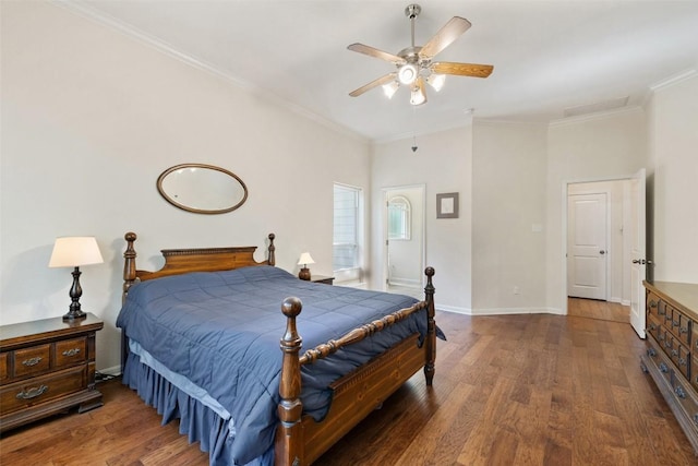 236 Pony Express Dr, Smithville, TX 78957 - bedroom with wood finished floors, ornamental molding, and a ceiling fan