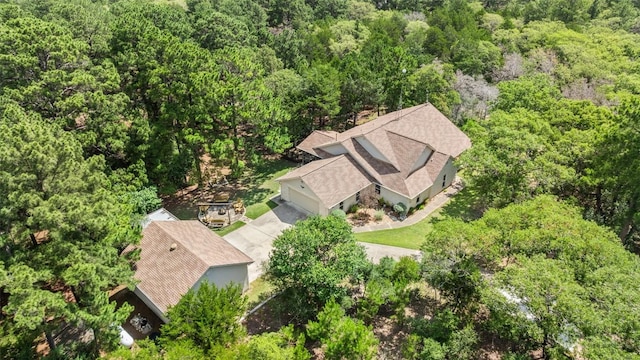 236 Pony Express Dr, Smithville, TX 78957 - aerial view of property and surrounding area with a heavily wooded area