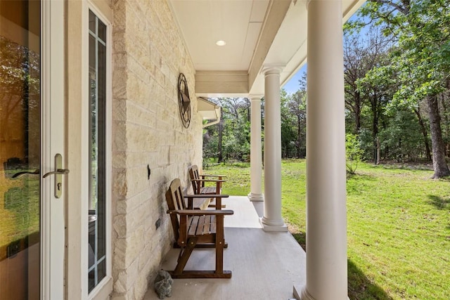 236 Pony Express Dr, Smithville, TX 78957 - covered porch with a yard