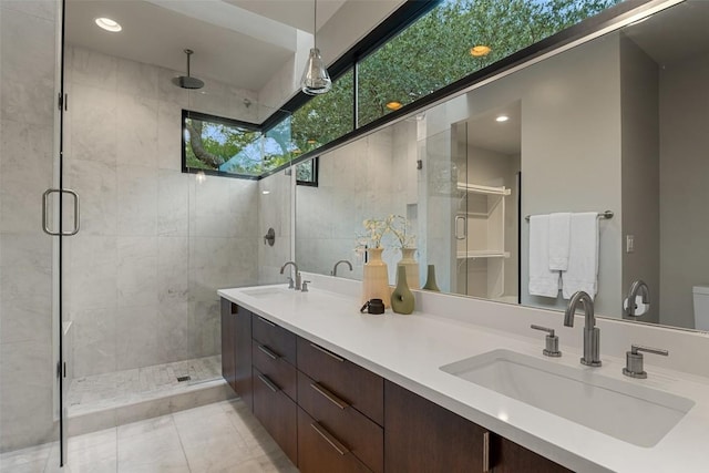 1327 Bonham Ter Unit B, Austin, TX 78704 - full bath with a stall shower, double vanity, and tile patterned flooring