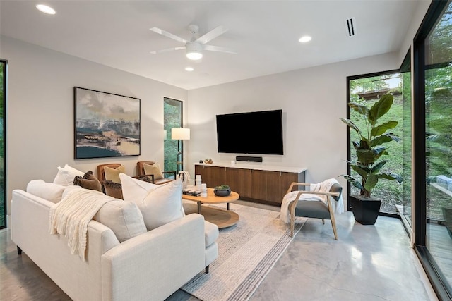 1327 Bonham Ter Unit B, Austin, TX 78704 - living room featuring a ceiling fan, recessed lighting, and concrete floors