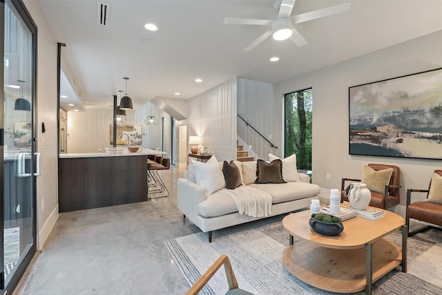 1327 Bonham Ter Unit B, Austin, TX 78704 - living area featuring stairs, concrete floors, ceiling fan, and recessed lighting
