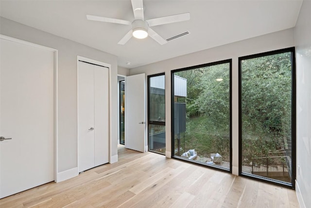 1327 Bonham Ter Unit B, Austin, TX 78704 - unfurnished bedroom featuring wood finished floors and ceiling fan