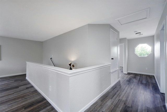 1109 Minerva St, Austin, TX 78753 - hallway with dark wood-type flooring and an upstairs landing