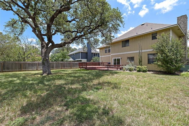 5910 Abilene Trl, Austin, TX 78749 - fenced backyard featuring a wooden deck