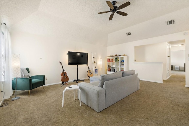 5910 Abilene Trl, Austin, TX 78749 - living area with carpet floors, a ceiling fan, a textured ceiling, and high vaulted ceiling