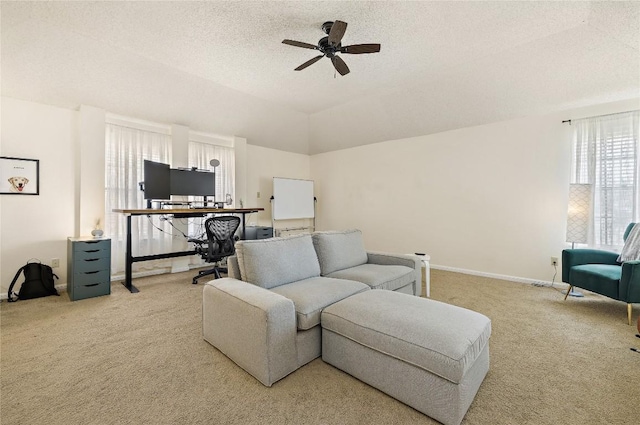 5910 Abilene Trl, Austin, TX 78749 - living room featuring carpet, ceiling fan, a textured ceiling, and lofted ceiling
