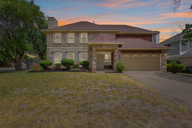 5910 Abilene Trl, Austin, TX 78749 - view of front of house with an attached garage, driveway, and a chimney