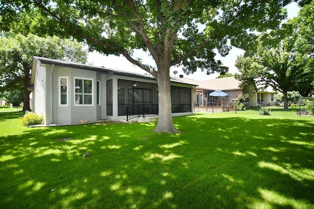 106 Bass St, Georgetown, TX 78633 - rear view of property featuring a sunroom and stucco siding