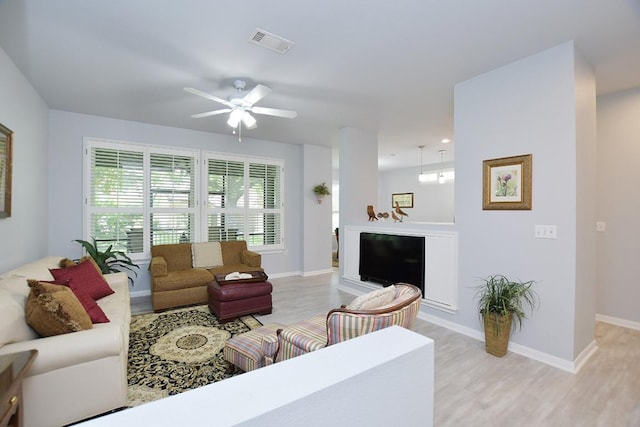 106 Bass St, Georgetown, TX 78633 - living room with light wood-type flooring and ceiling fan