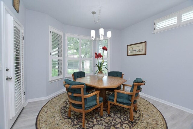 106 Bass St, Georgetown, TX 78633 - dining area with a chandelier and light wood finished floors