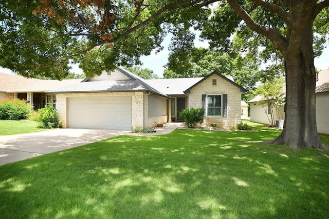 106 Bass St, Georgetown, TX 78633 - single story home featuring a garage, stone siding, a front lawn, and driveway