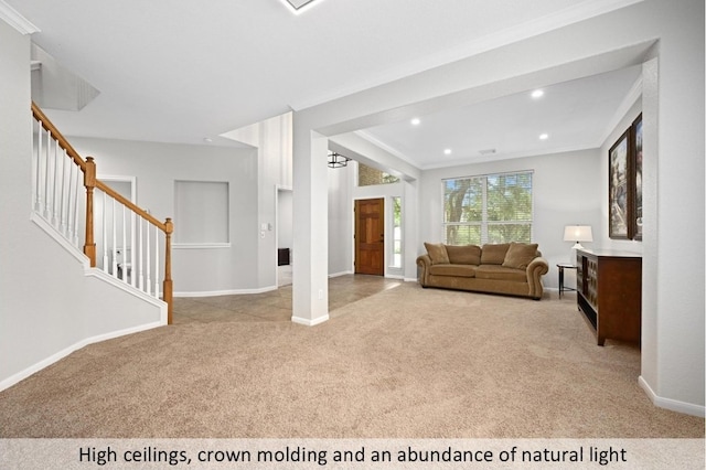 8300 Fern Bluff Ave, Round Rock, TX 78681 - living area with light colored carpet, crown molding, stairway, and recessed lighting