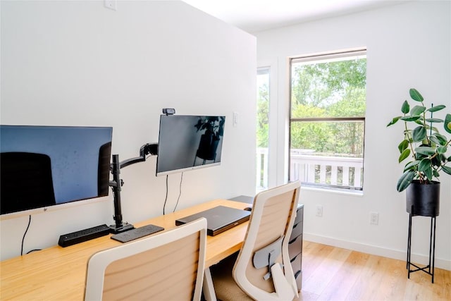 4407 Ganymede Dr, Austin, TX 78727 - office area with plenty of natural light and light wood-style flooring
