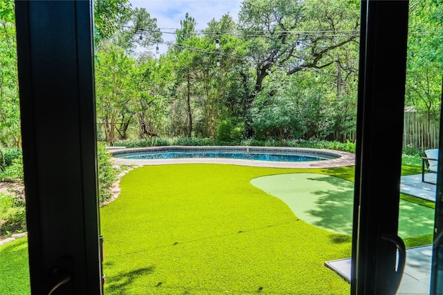 4407 Ganymede Dr, Austin, TX 78727 - swimming pool featuring a putting area